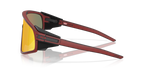 Oakley Latch panel 0OO9404 940423 Smećkasto-crvena red knight / Prizm ruby